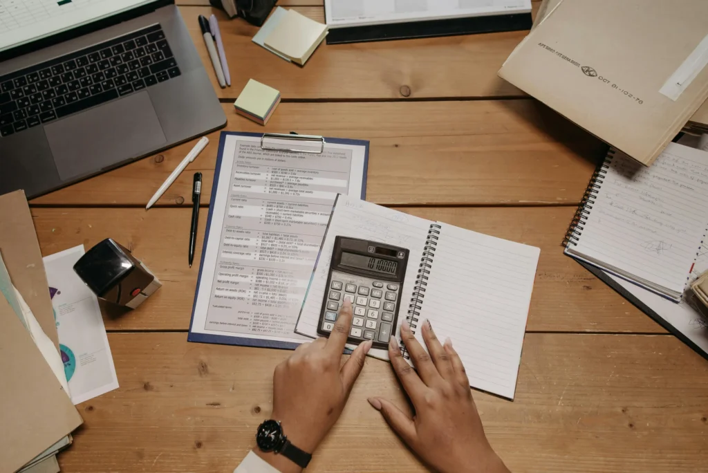 sample photo of calculator on desk for topic about guide to rental property loans