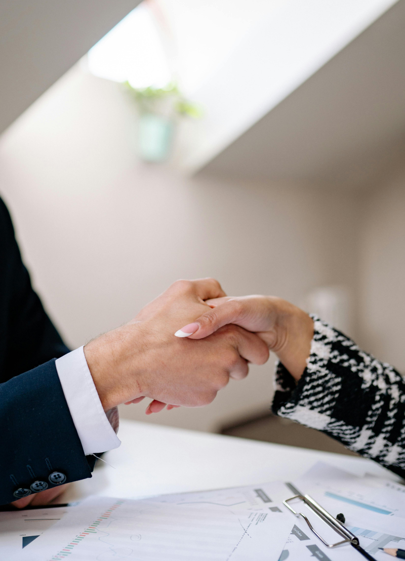 shaking hands after done deal on trust loans at brisbane