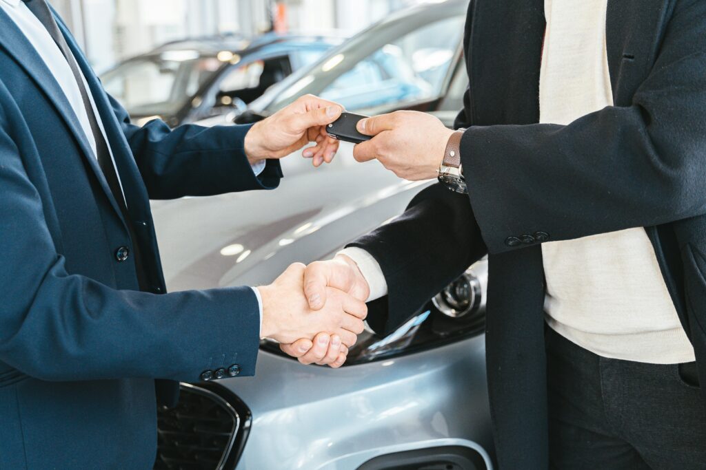 handshake after successful car deal