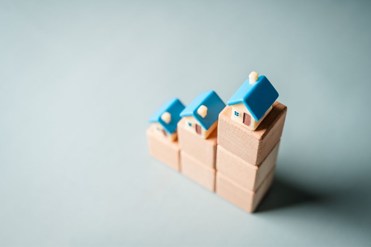Investment Property Loan Brisbane - two houses showing equity growing into an investment