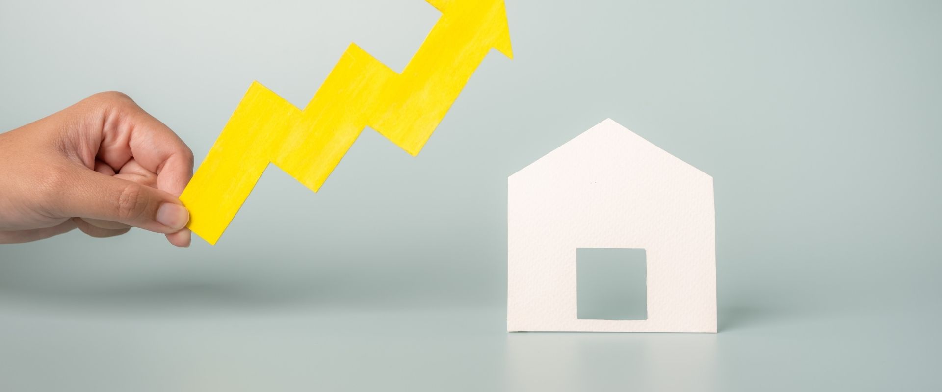Refinance Home Loan Brisbane - a homeowner reviewing mortgage statements