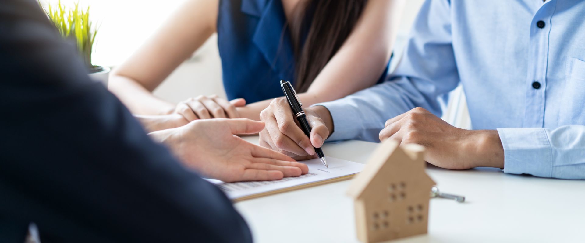 First Home Buyer Stamp Duty QLD - a Queensland transfer duty form with a pen and a house key