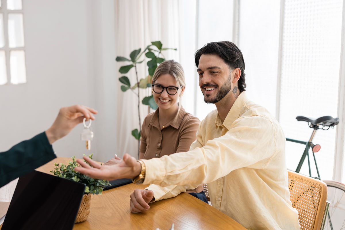 First Home Guarantee Brisbane - a 5 percent deposit of coins and a house model for the guarantee